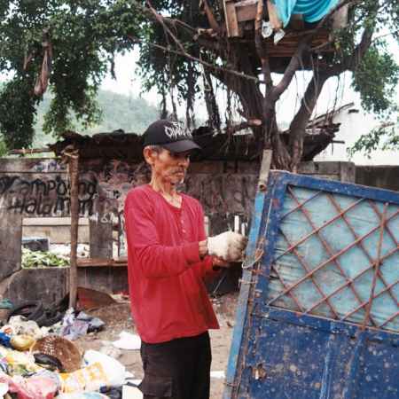 A man working with waste